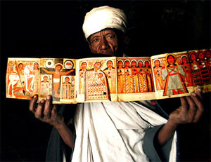 Эфиопский монах показывает старинную книгу. http://flickr.com/